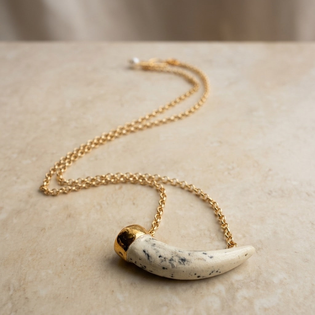 Mini tusk pendant necklace